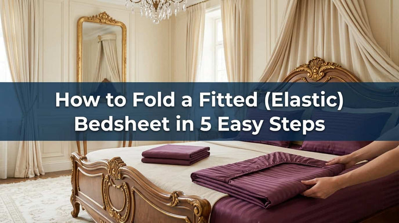 Purple fitted elastic bedsheet folded neatly on a bed
