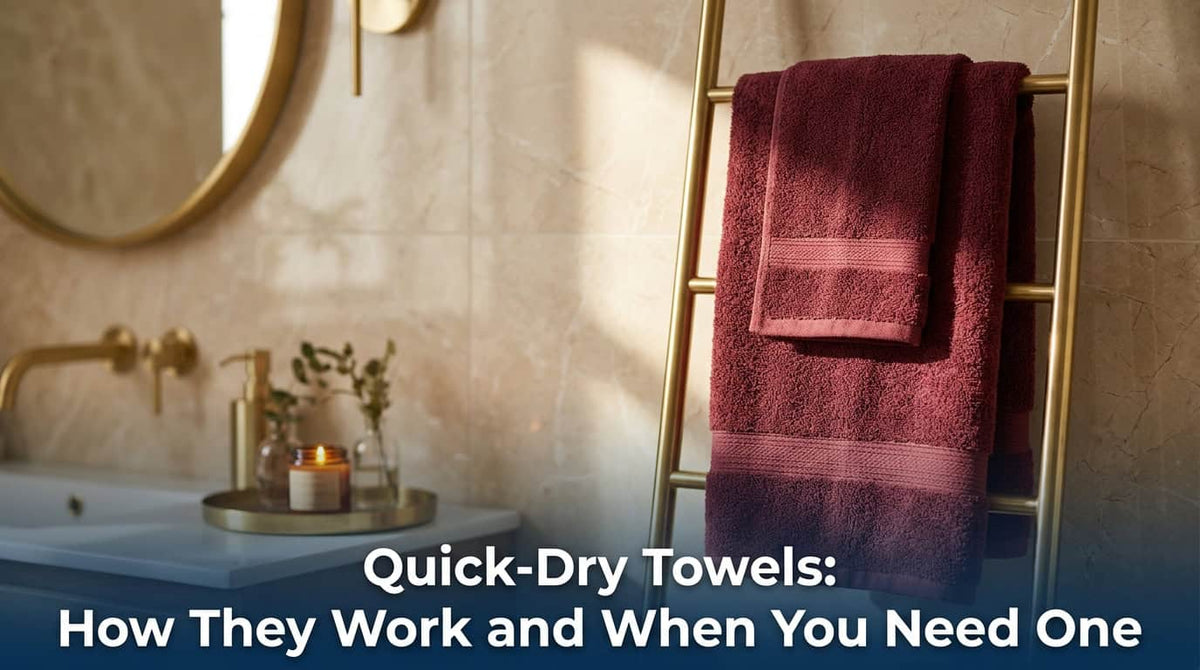 Maroon towel hanging on a towel rail to dry