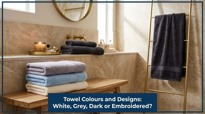 Stacks of towels in blue, purple, cream and grey