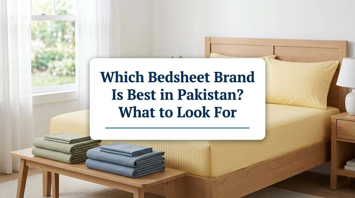 Cream bedsheet on a bed with stacks of folded sheets