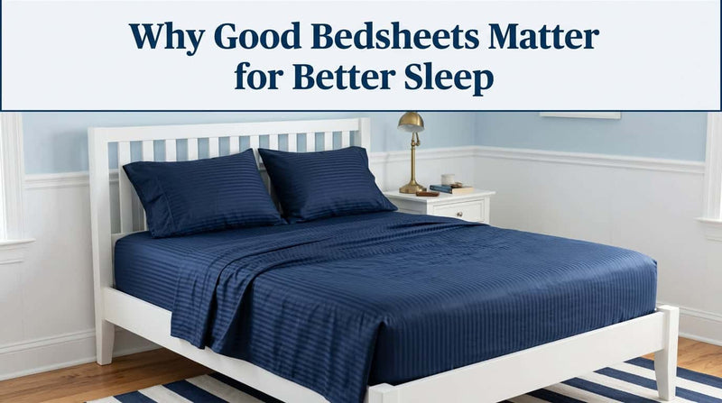 Navy blue bedsheet and pillows on a neatly made bed