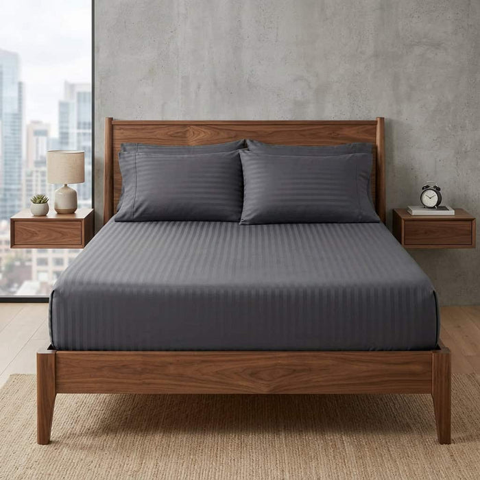 Charcoal grey cotton fitted bedsheet with 2 pillow covers on a king size bed