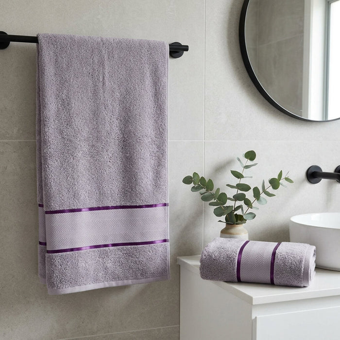 Lavender grey cotton bath towels hanging in a bathroom, Home Living 2 piece towel set