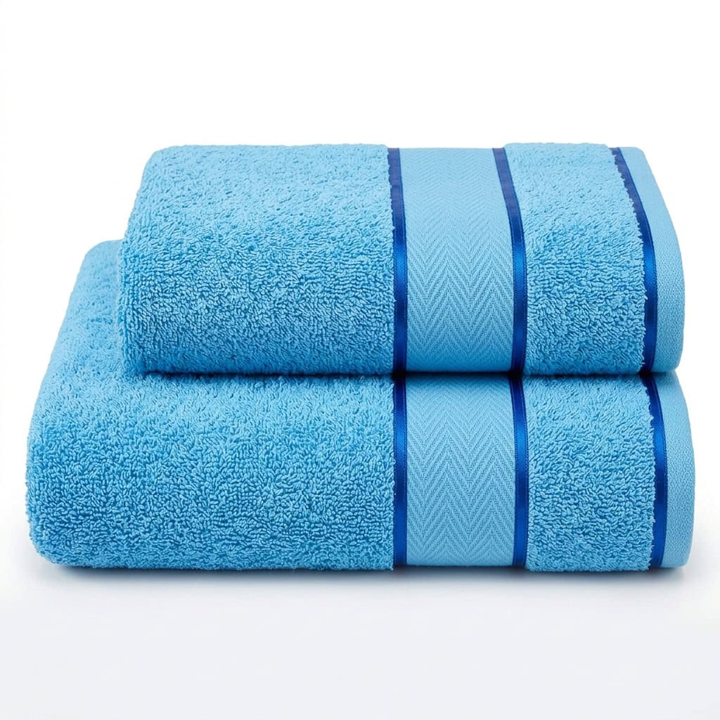 Sky blue large (30 x 90) and medium (30 x 60) cotton towels folded and stacked